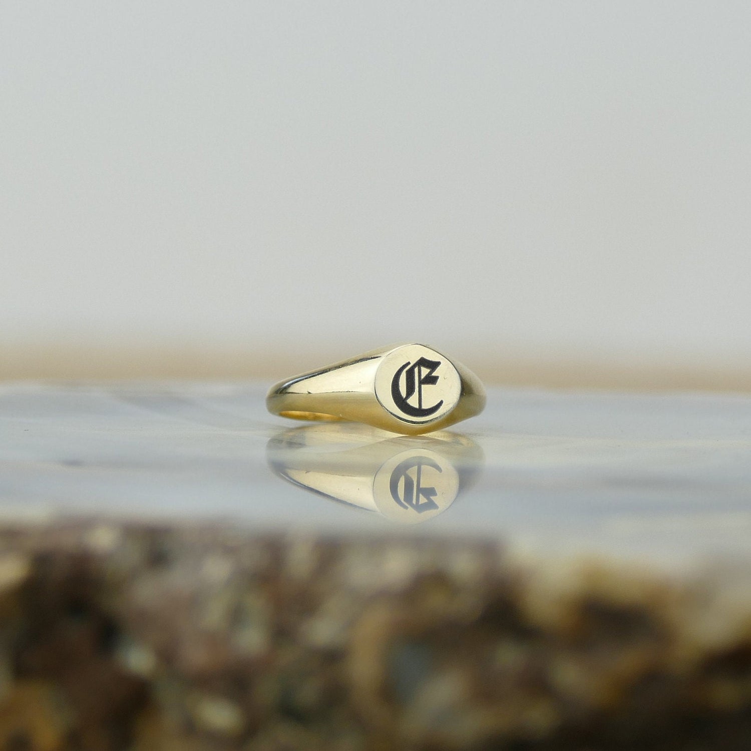 Gold Engraved ring in jewellery photoshoot